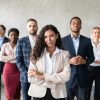 successful-businesswoman-standing-in-front-of-busi-2021-08-30-00-05-01-utc